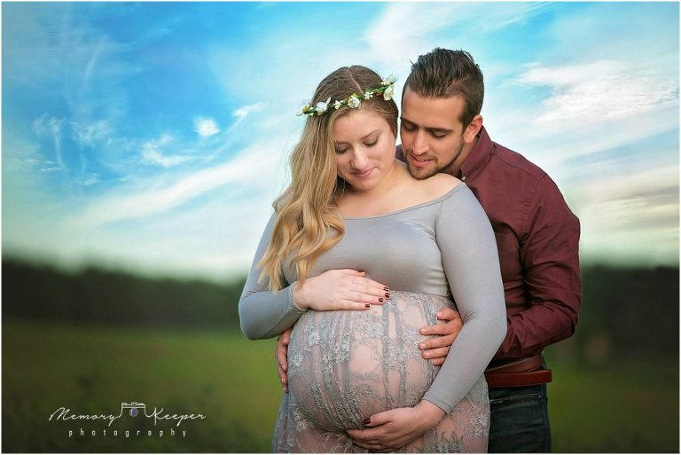 mother and father to be patiently awaiting baby